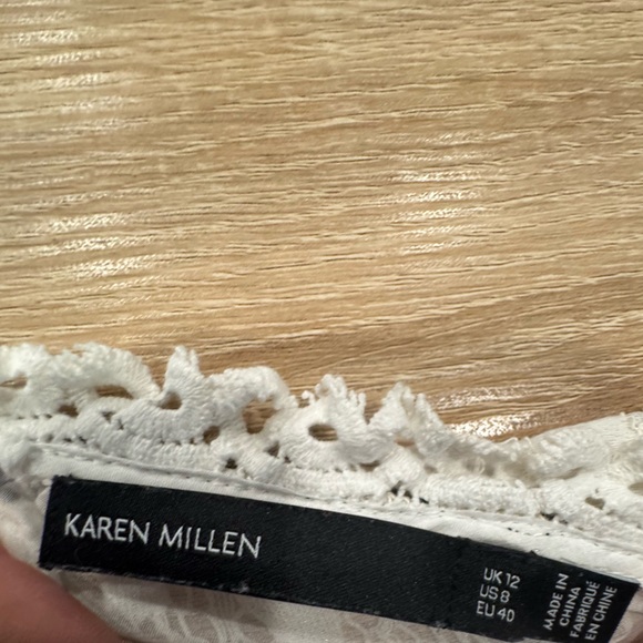 White Lace Sleeveless Top with Black Trim - Picture 7 of 10